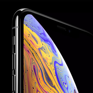 A smartphone displays a colorful, abstract swirl pattern on its screen, against a black background