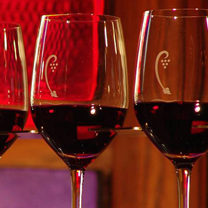 Up Close Three Wine Glasses with Red Wine